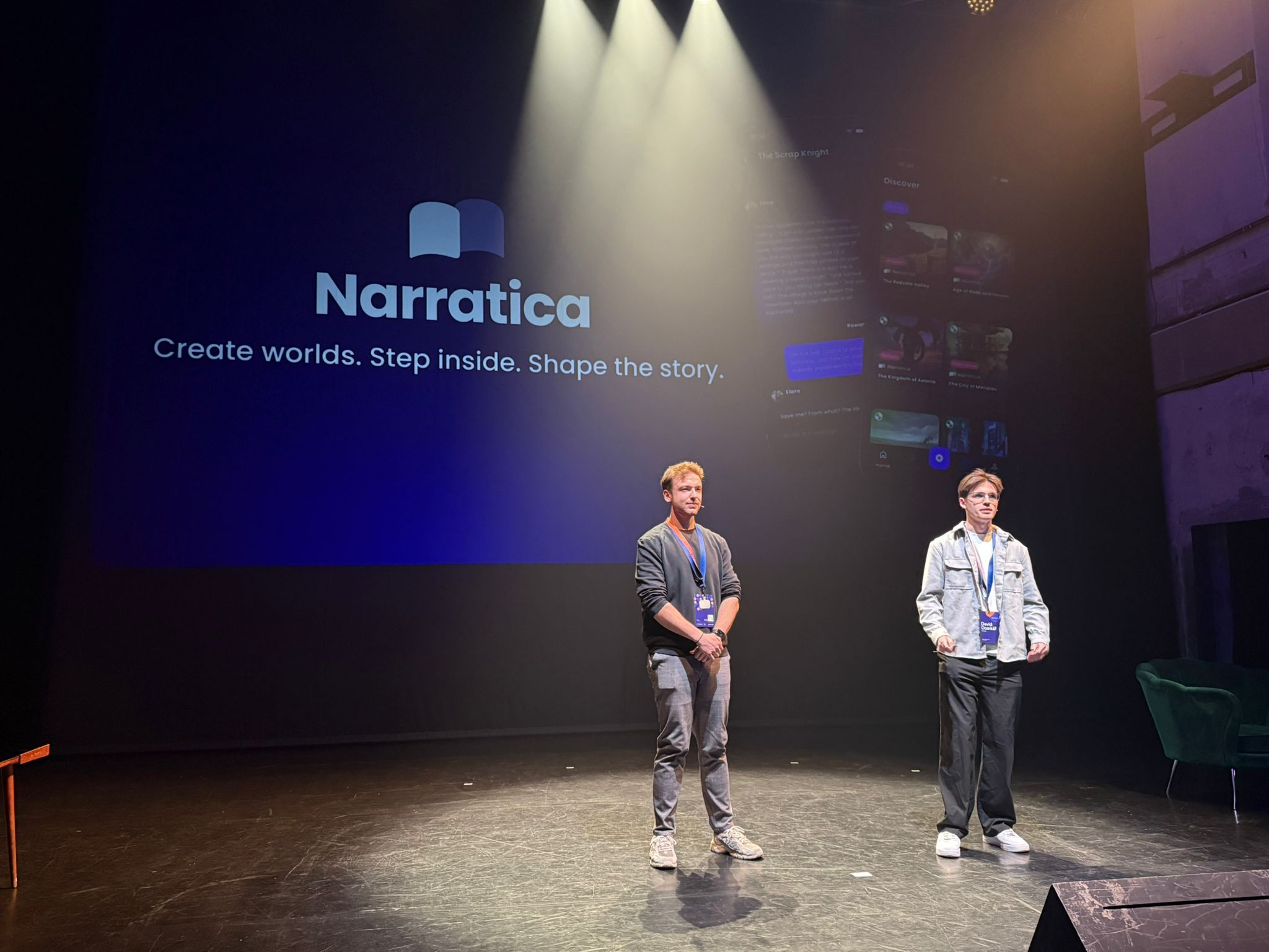 Two of the team on stage, presenting Narratica at Ynovate Fest